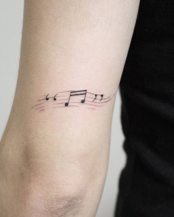 Tatuajes chiquitos para mujer - Notas musicales