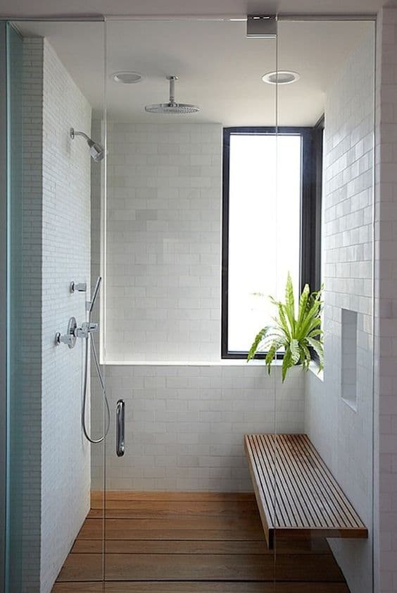 Baños minimalistas: Ideas para decorar tu baño - Asiento de regadera