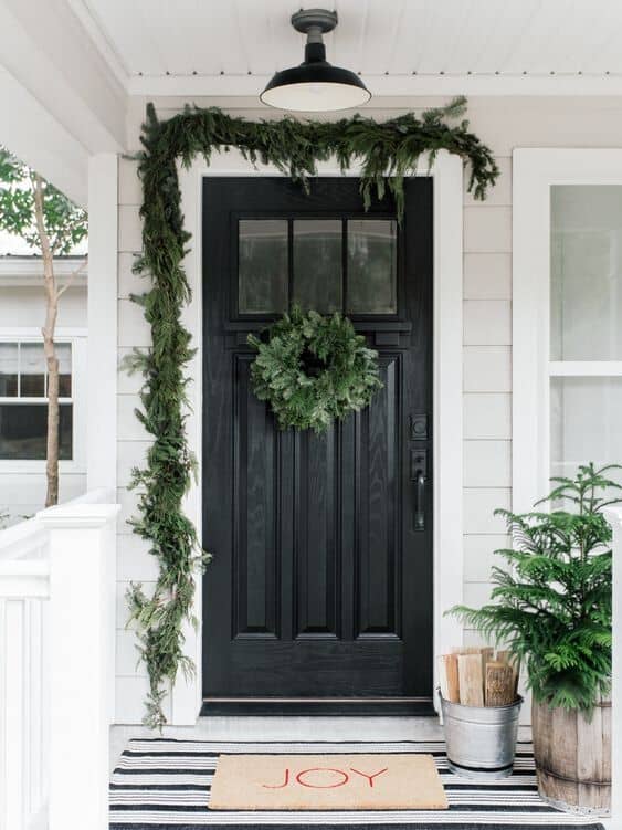 Puertas decoradas de navidad - Una elección asimétrica